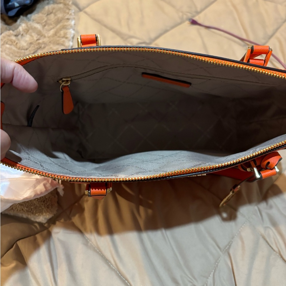 NWOT used once beautiful orange in color